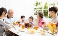 Asian family having dinnerÃÂ at home Royalty Free Stock Photo